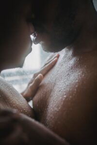 close up of couple shower together